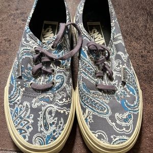 Blue Vans tennis shoes